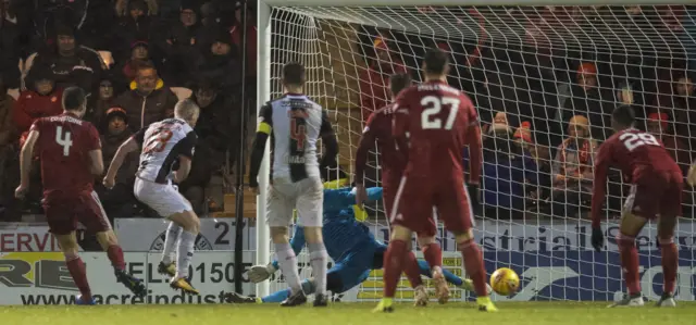 Cameron MacPherson scores for St Mirren in the first half