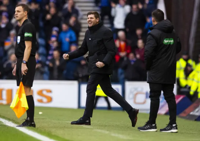 Steven Gerrard celebrates the early opener at Ibrox