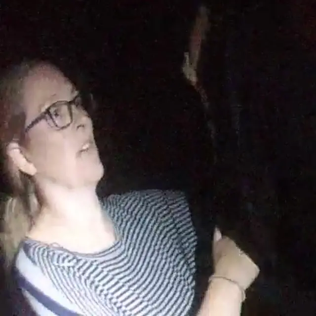 Bodycam image of mystery woman