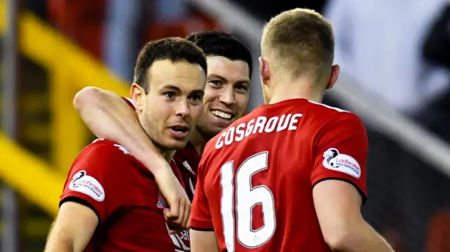 Andrew Considine celebrates