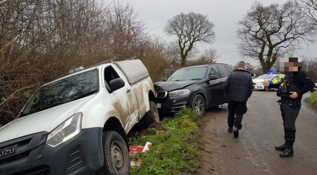 A crashed van and police