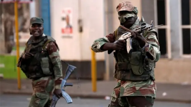 Soldiers open fire to disperse crowds of the opposition Movement for Democratic Change supporters in Harare, Zimbabwe