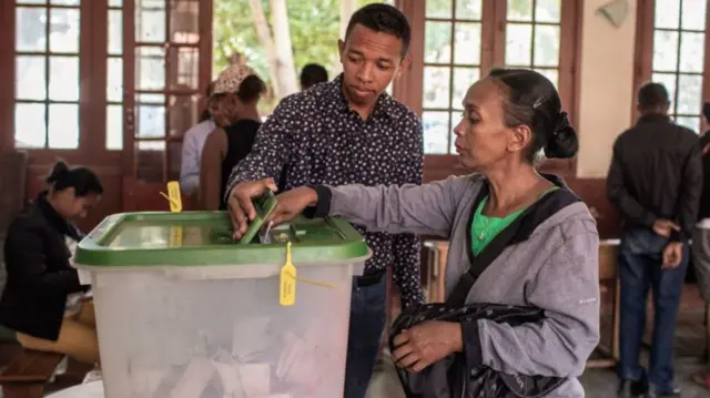 Voters take part in the runoff election