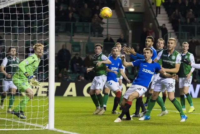 Gareth McAuley prodded the ball wide from close range following a Rangers corner