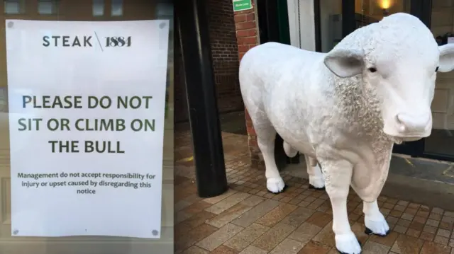 Sign outside the steakhouse