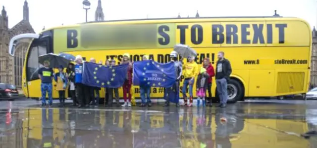 Bus and protesters