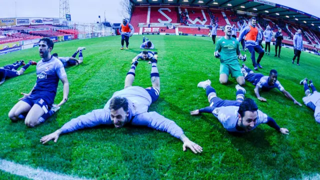 Woking players celebrate