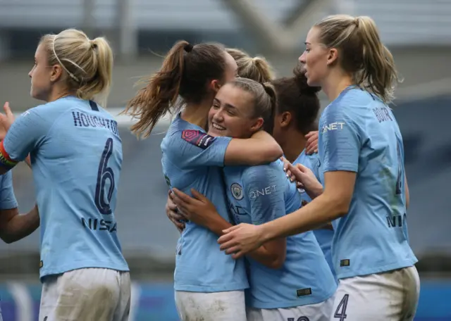 Georgia Stanway celebrates.