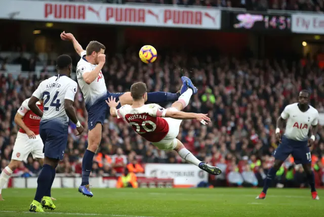 Shkodran Mustafi attempts an overhead kick