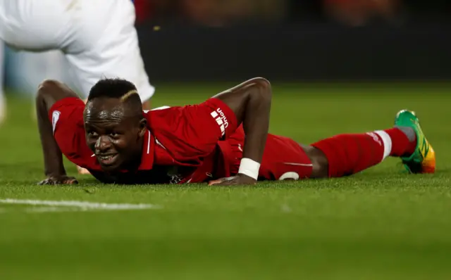 Sadio Mane reacts to his missed chance