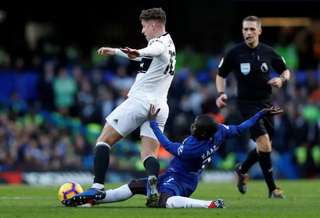 Tom Cairney is fouled by N'Golo Kante