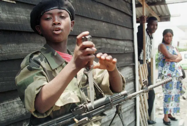 Child soldier in DR Congo, pictured in 1998