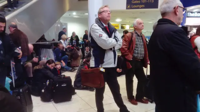 Passengers waiting for flights at Gatwick Airport