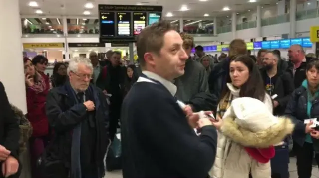 Passengers stranded at Gatwick waited for updates on their travel options