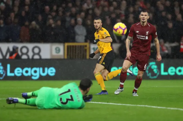 Alisson and Romain Saiss