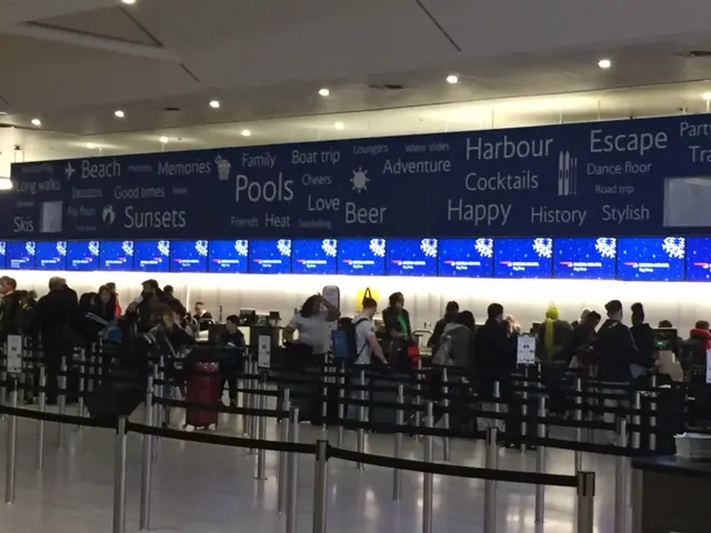 Passengers queuing at Gatwick