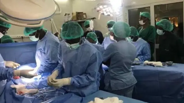 Medical staff pictured during the procedure in Senegal