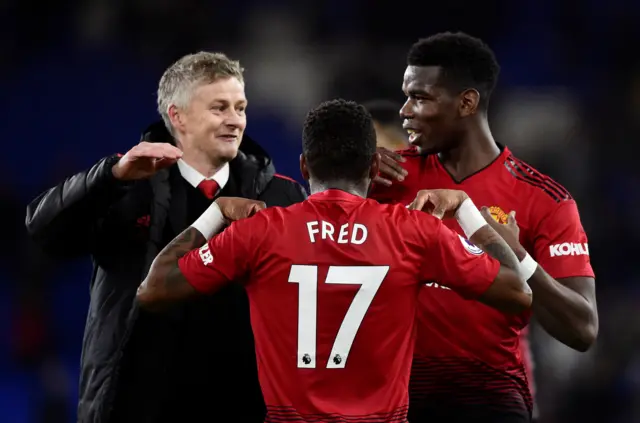 Ole Gunnar Solskjaer celebrates with Paul Pogba and Fred