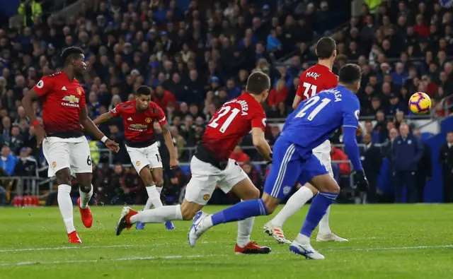 Marcus Rashford scores from a free kick