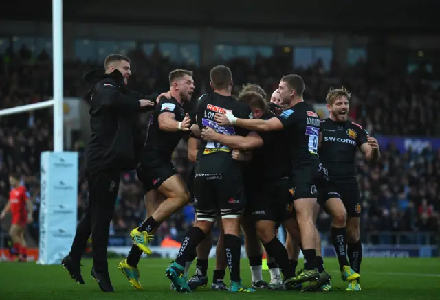 Exeter celebrate their try