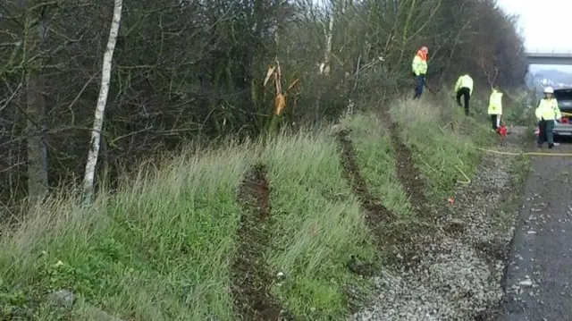 Tyre tracks on hard shoulder