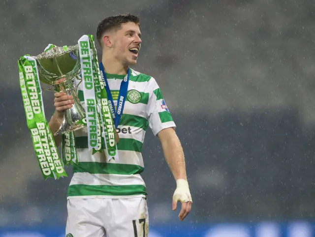 Ryan Christie celebrates with the League Cup trophy