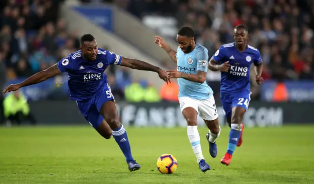 Wes Morgan and Raheem Sterling