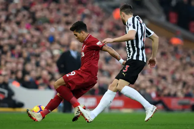 Roberto Firmino and Paul Dummett