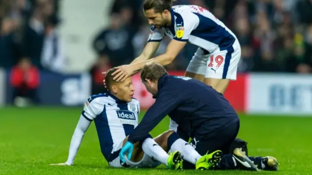 Dwight Gayle getting treatment during the game