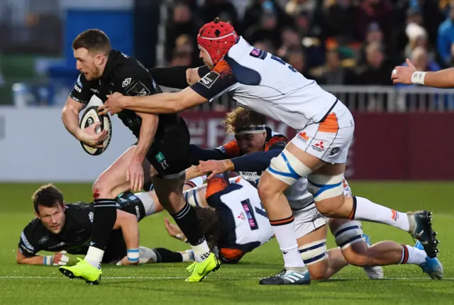 Grant Gilchrist (right) tackles Stuart Hogg in the first half