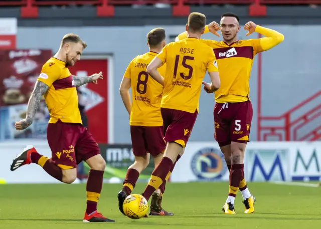 Tom Aldred celebrates his first goal of the afternoon