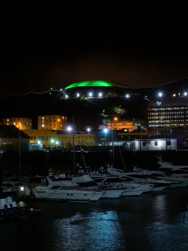 Jersey's Fort Regent lit green