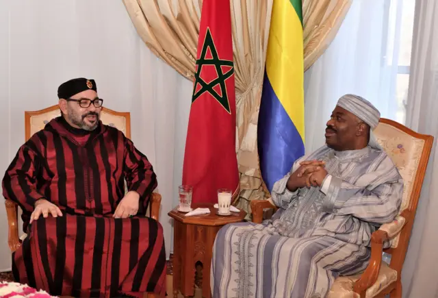 Morocco's King Mohamed VI (L) visits Gabon"s President Ali Bongo at the military hospital in the capital Rabat