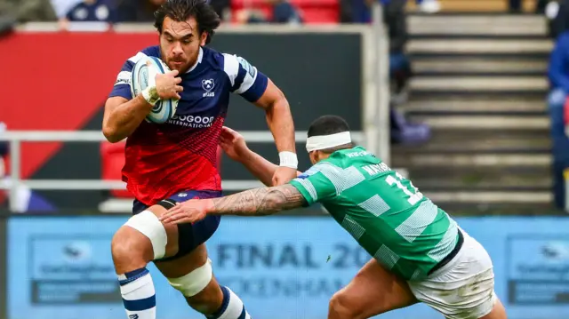 Steve Luatua of Bristol Bears is tackled by Josh Matavesi of Newcastle Falcons