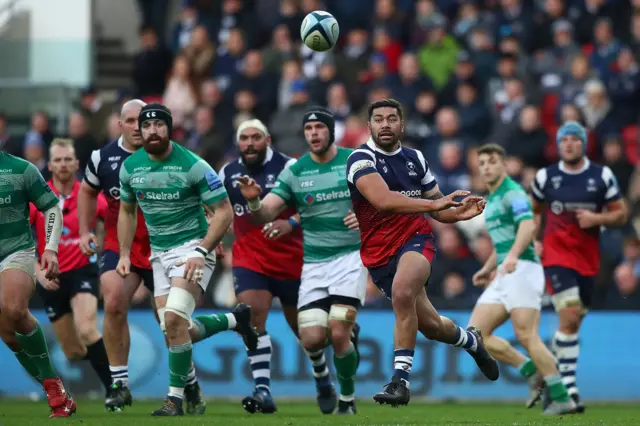 Charles Piutau of Bristol feeds a pass