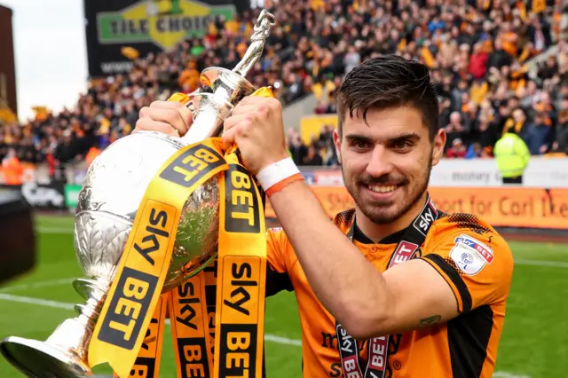 Wolves midfielder Ruben Neves with the Championship trophy