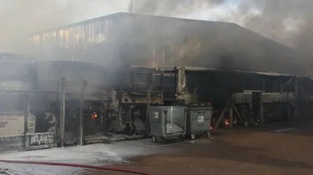 The shells of the destroyed coaches