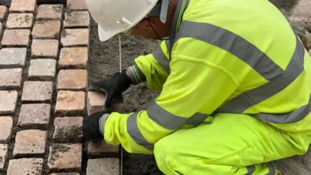 laying paving