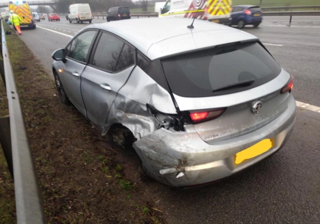 A smashed up car on the M69