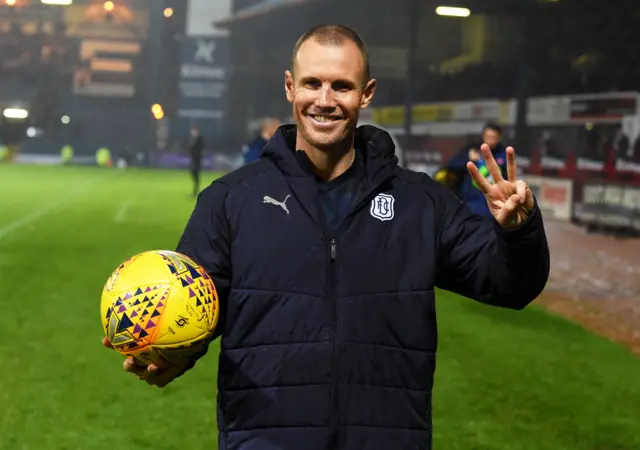 Kenny Miller takes the match ball home after his hat-trick