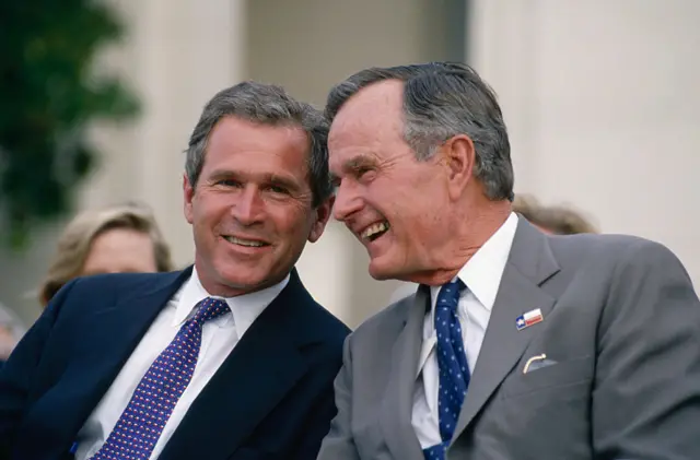 George W. Bush attends the Texas State Fair with his father, former president George Bush, during his campaign for governor in 1994. Bush won the race for governor, and was elected to an historic second term in 1998. (Photo: Greg Smith/CORBIS/Corbis via Getty Images)