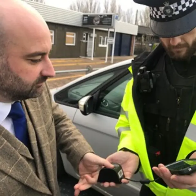 Police and Crime Commissioner Marc Jones testing new scanner