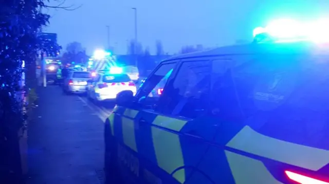 Police cars on road