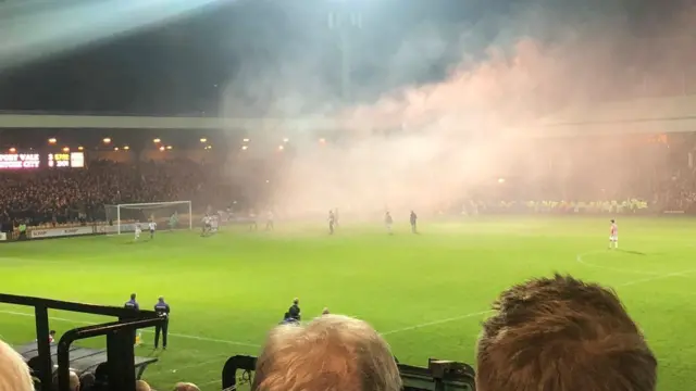 Smoke during the game from a flare