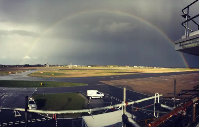 rainbow over airfield