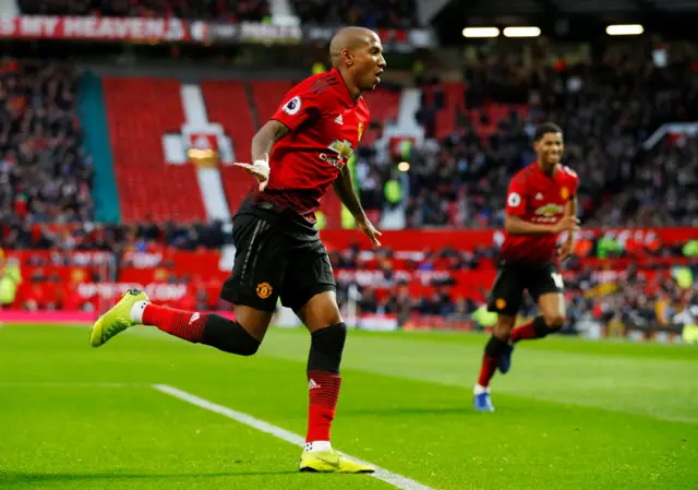 Ashley Young celebrates