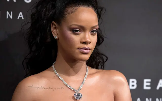 Rihanna attends an event for her Fenty Beauty range