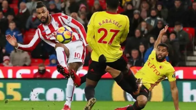 Eric Maxim Choupo-Moting curls a shot wide for Stoke City