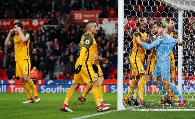 Brighton goalkeeper Mat Ryan saves a penalty