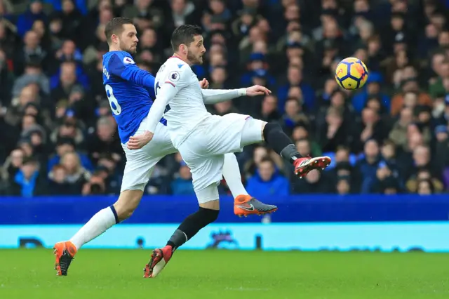 Gylfi Sigurdsson battles for possession